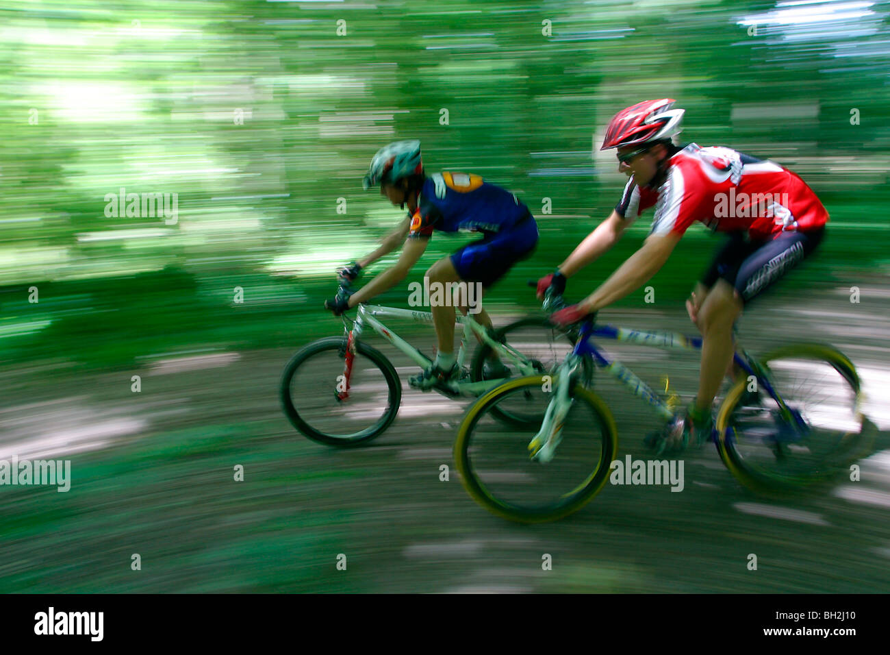 Open air activities mountain bike ride in the forest hi-res stock ...
