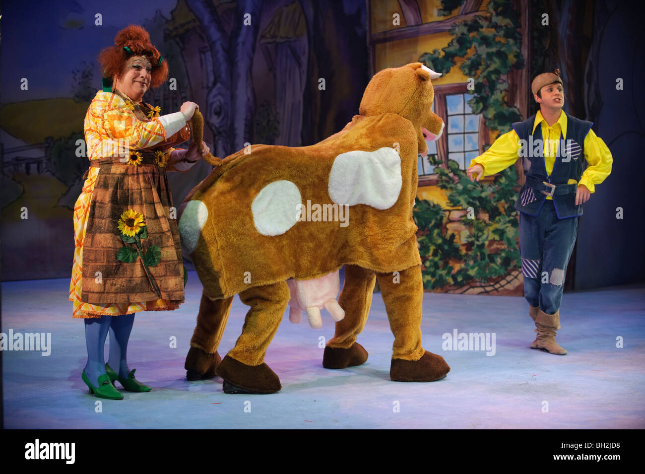 https://c8.alamy.com/comp/BH2JD8/a-production-of-jack-and-the-beanstalk-panto-dame-milking-the-traditional-BH2JD8.jpg