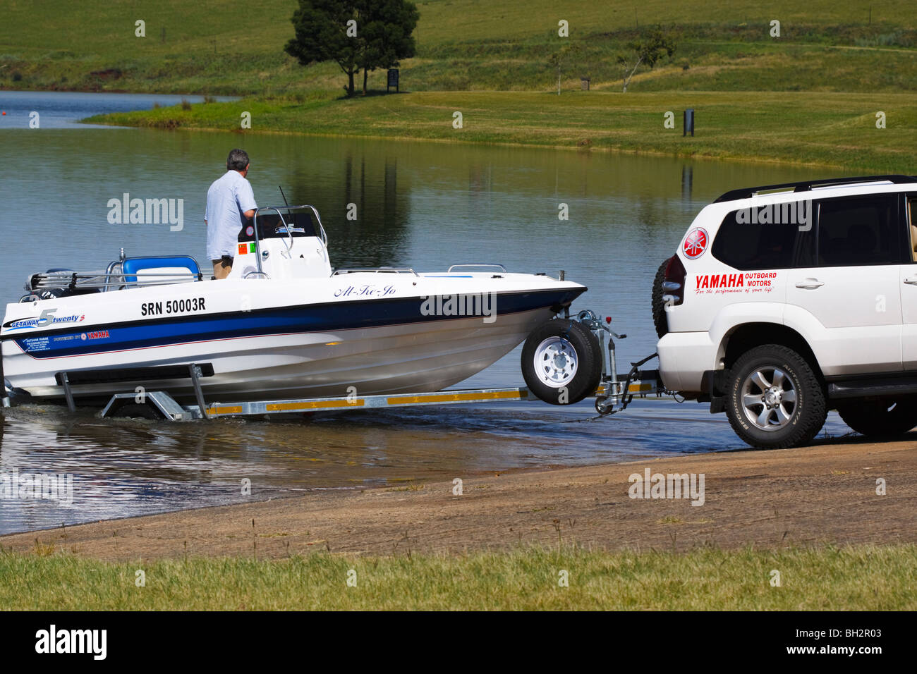 Motor boat being launched off the slip at Midmar dam, Midlands, Kwazulu Natal, South Africa. Stock Photo