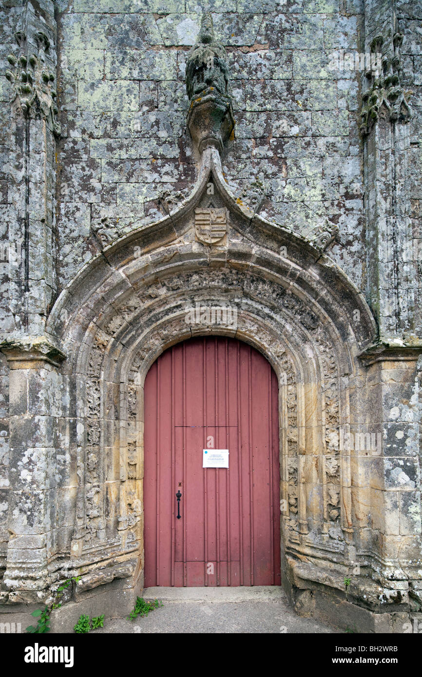 Entrance door of the Trinity chapel, town of Plumergat, departement of Morbihan, Brittany, France Stock Photo