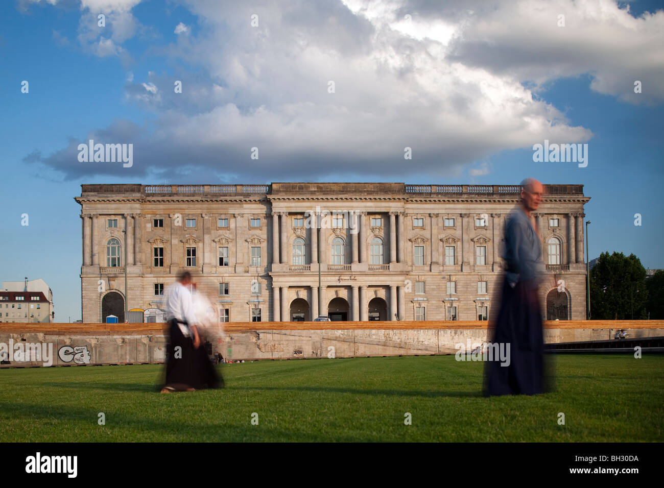 People practicing martial arts, Schlossplatz, Berlin, Germany Stock Photo