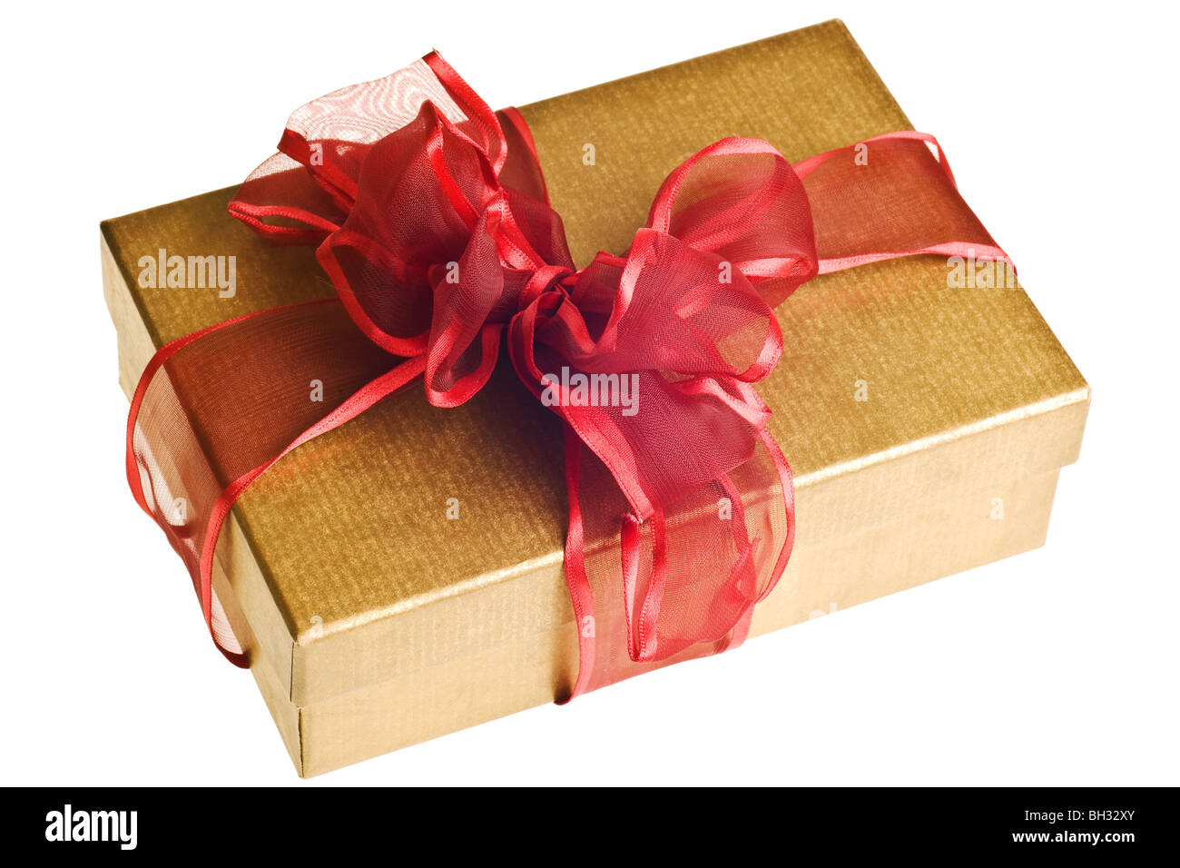 gold gift with red bow isolated on white background Stock Photo - Alamy