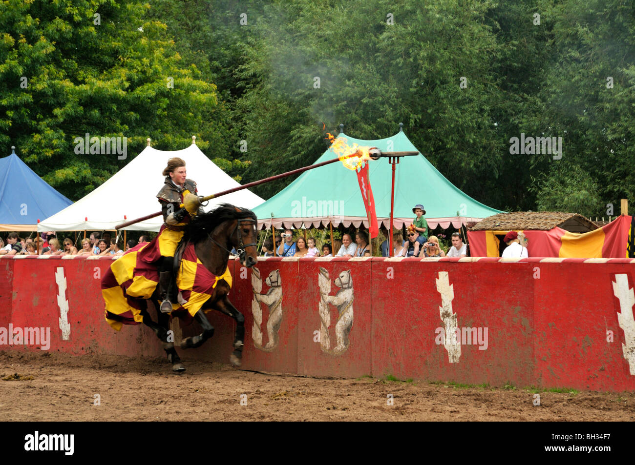 Knight demonstrating their riding skills at Warwick castle, UK. Stock Photo