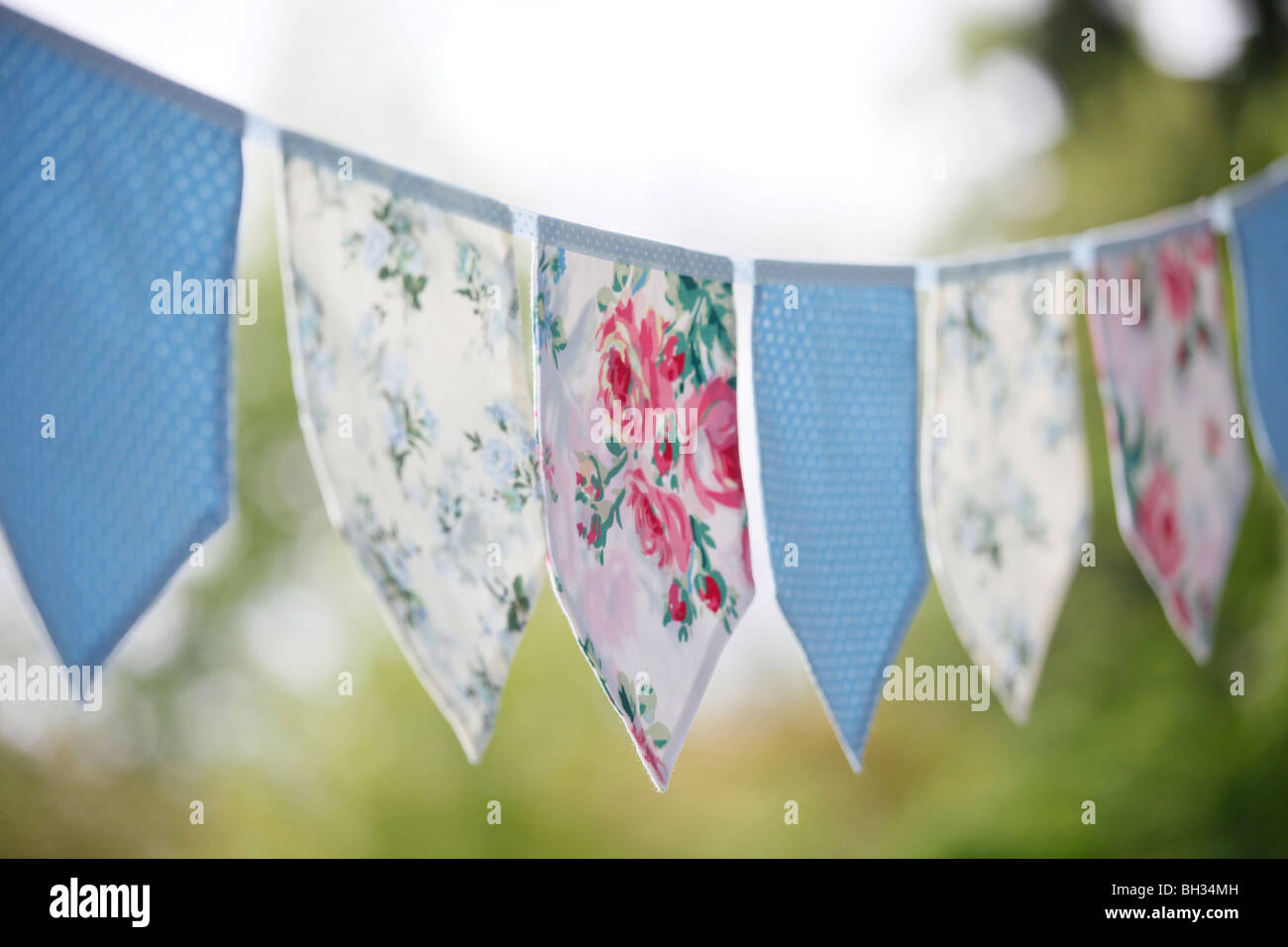 Fabric Bunting in a garden Stock Photo