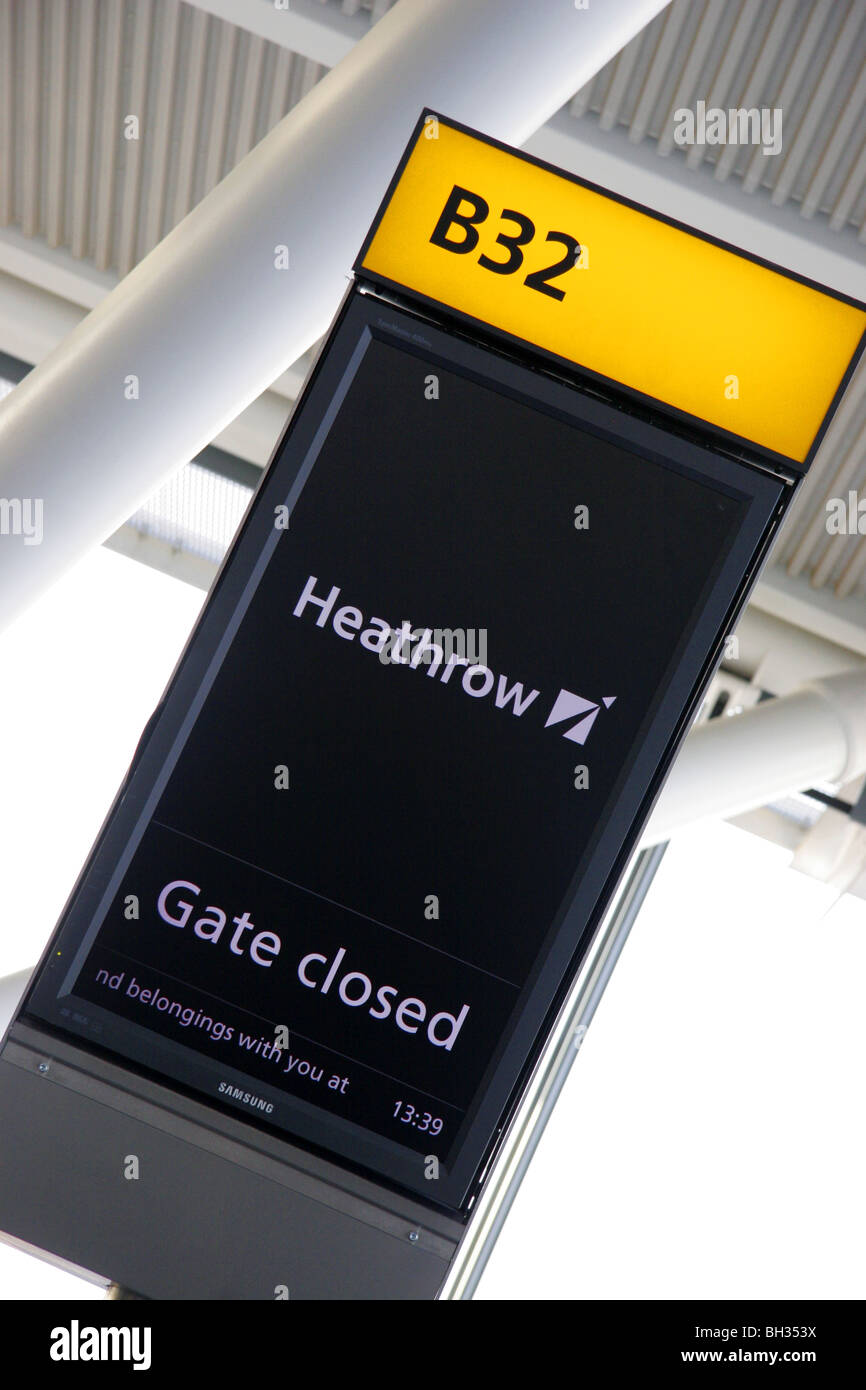 Gate closed sign at Heathrow Airport Stock Photo