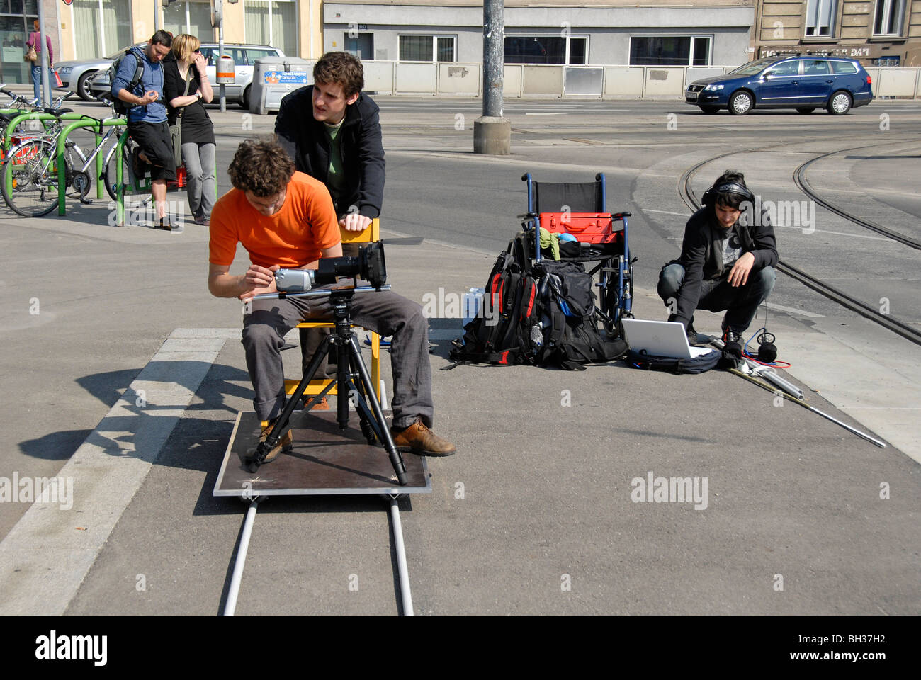 Low budget film shooting, cameraman on dolly, sound engineer, Vienna, Austria, Europe Stock Photo