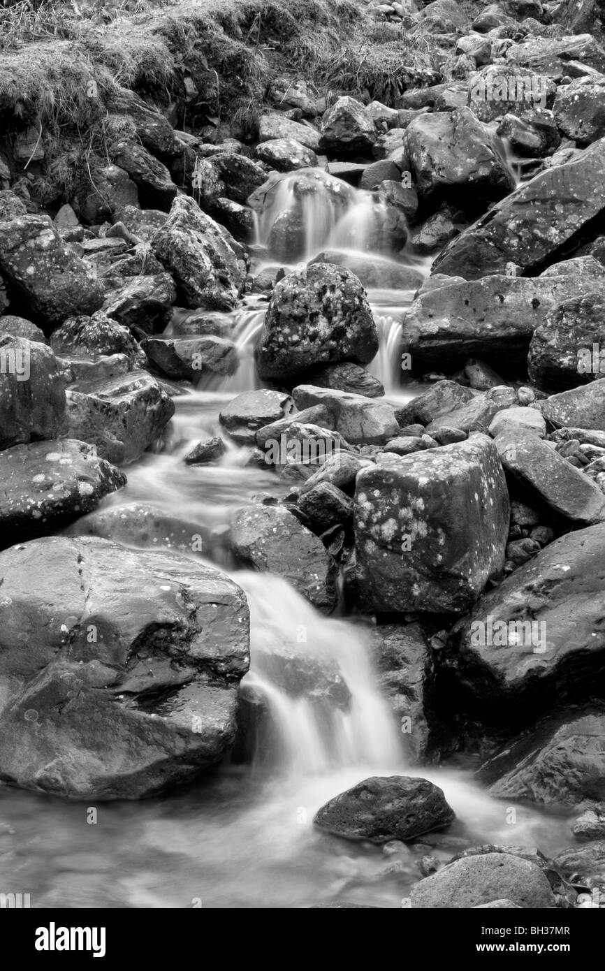 Waterfalls in a mountain stream, above Rosthwaite in Borrowdale, Lake District National Park, Cumbria, UK Stock Photo
