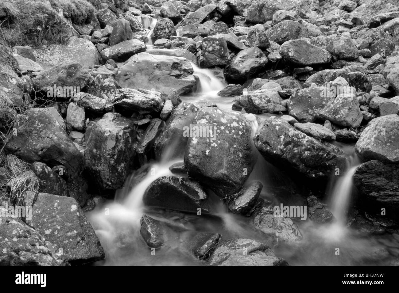 Waterfalls in a mountain stream, above Rosthwaite in Borrowdale, Lake District National Park, Cumbria, UK Stock Photo