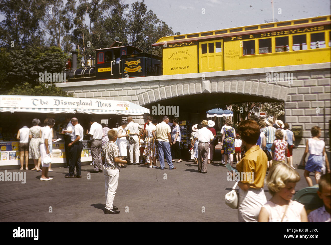 Santa Fe and Disney train and the Disneyland News stand. Disneyland vacation Kodachromes from 1962.  Stock Photo