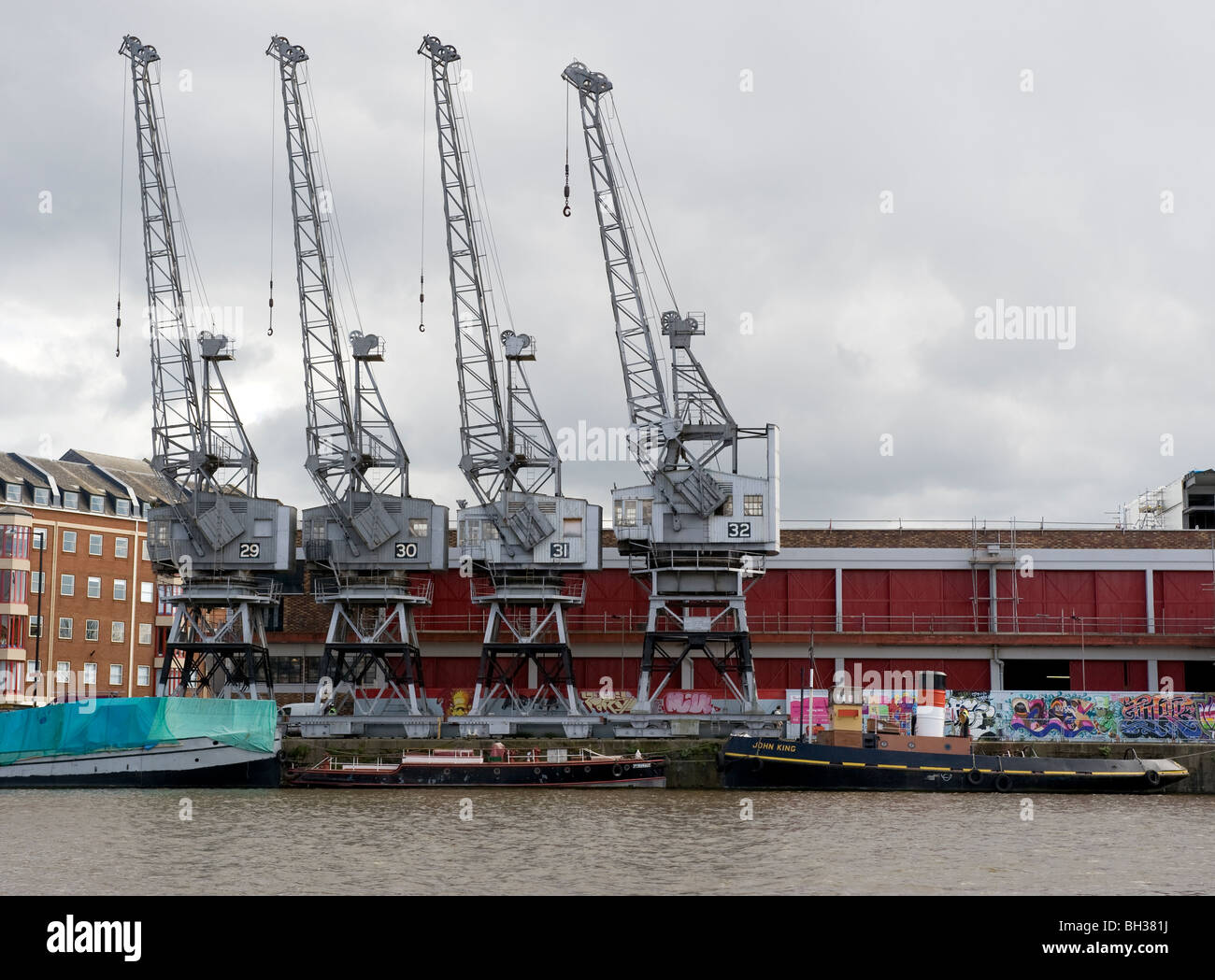 Cranes and M Shed at Bristol Historic Docks, Wapping Wharf,  Bristol, England, UK Stock Photo
