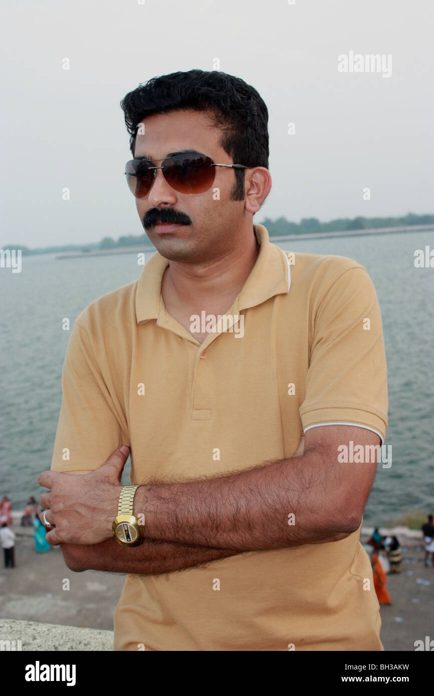 Stylish Pose of an Indian Young Man with sunglasses Stock Photo - Alamy