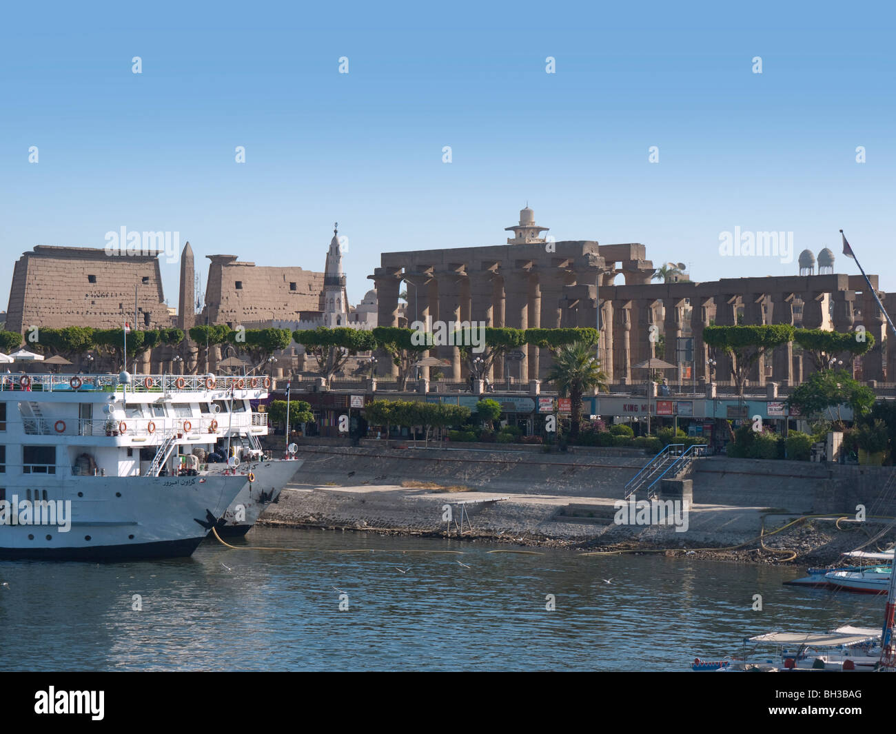 The Temple at Luxor with cruise boats on the River Nile on a Nile ...