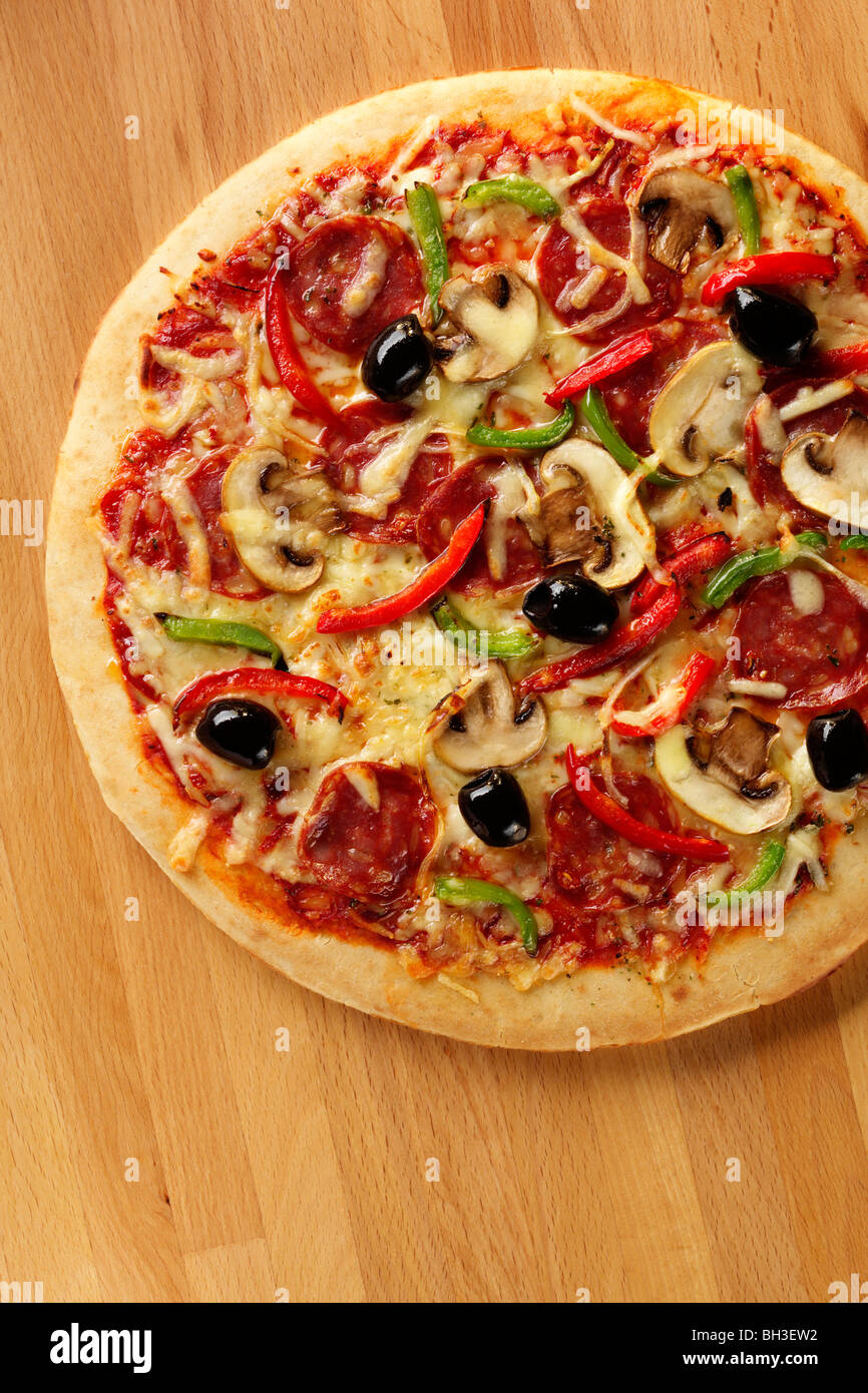 Pizza on a worktop Stock Photo