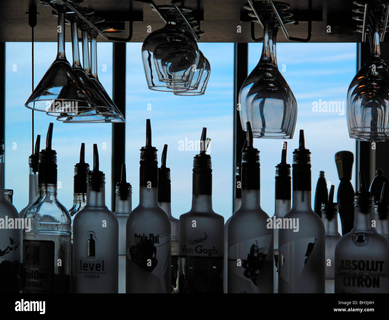 Liquor bottles and bar glasses on cruise ship Stock Photo Alamy