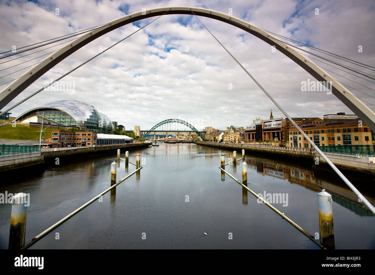Gateshead Millenium Bridge with The Sage, Tyne and Bridges in the background, Newcastle-upon-Tyne, England Stock Photo