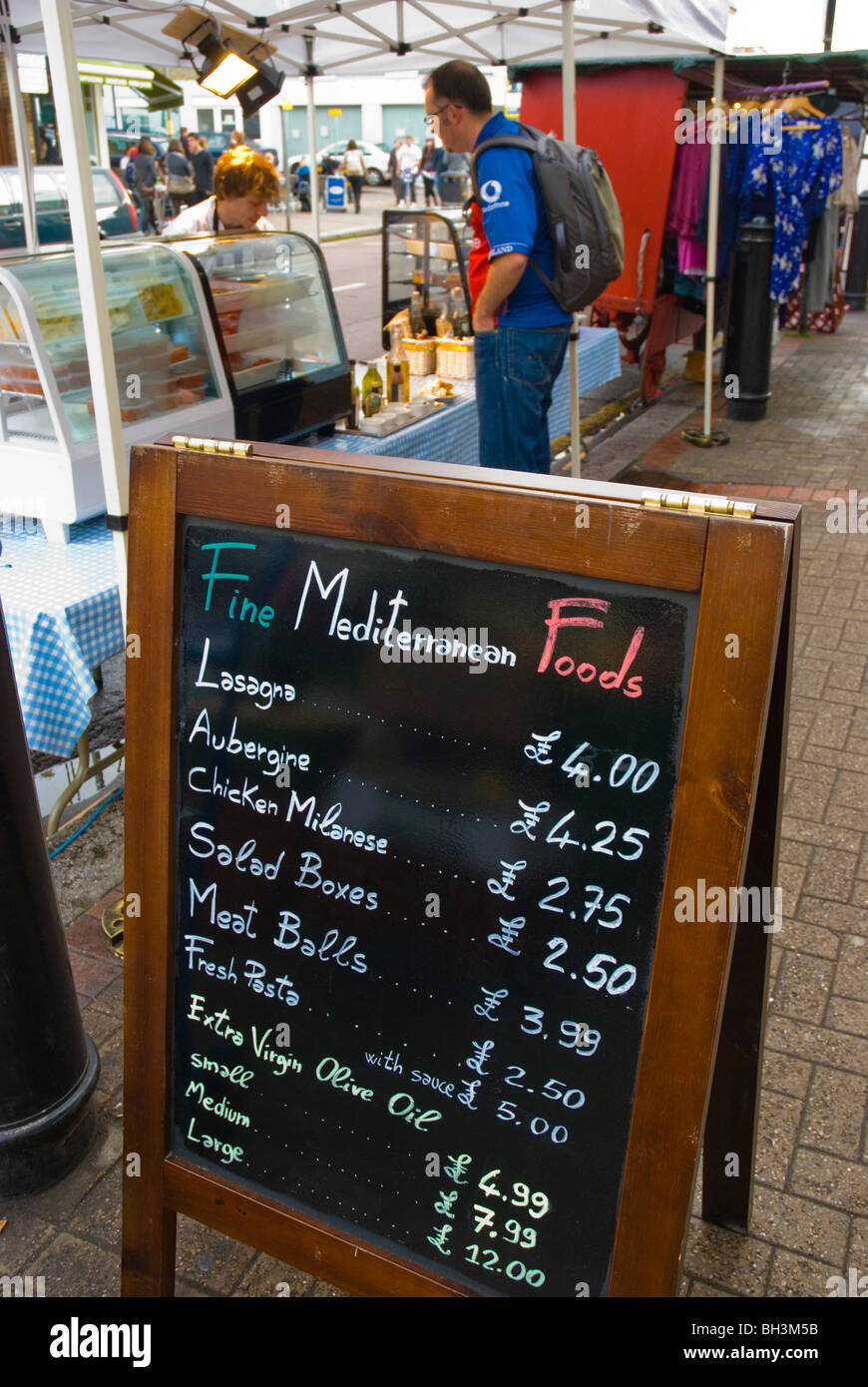 Stall selling Mediterranean foods Northcote Road Wandsworth South London England UK Europe Stock Photo