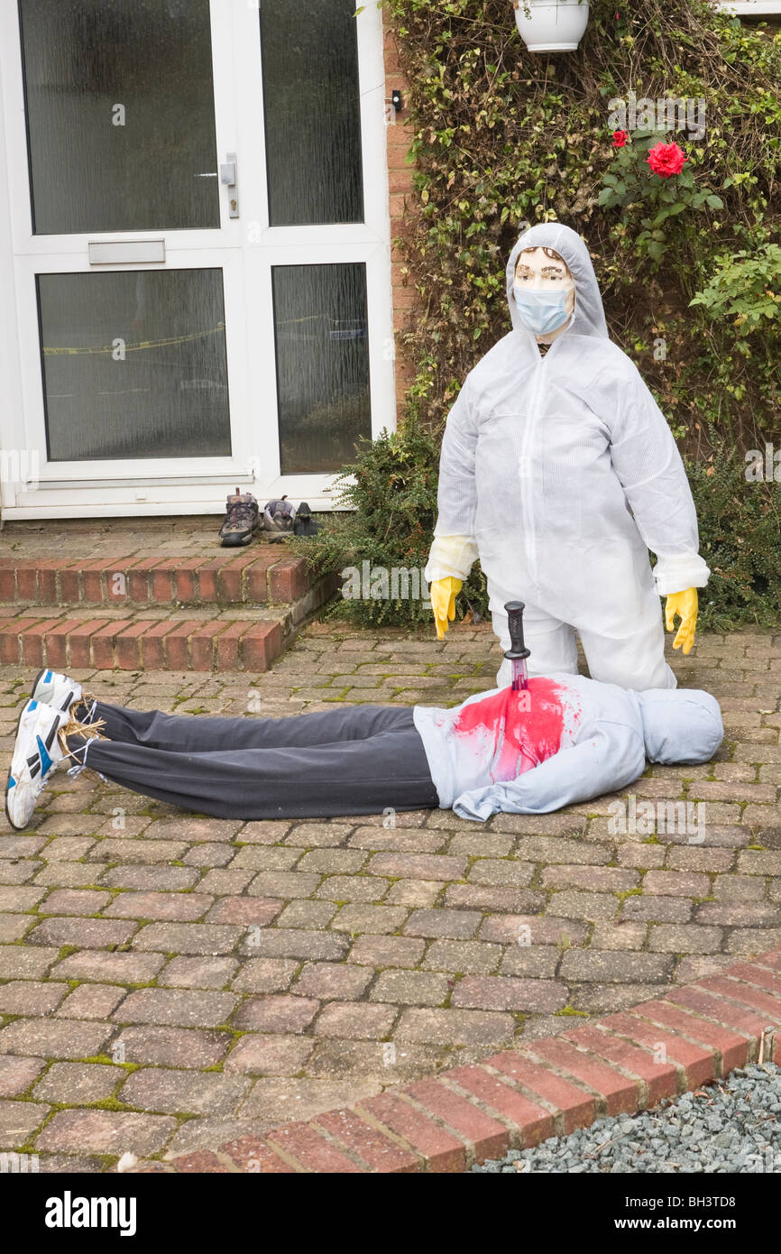 Scarecrow CSI and stabbed victim at Flamstead Scarecrow Festival Stock Photo