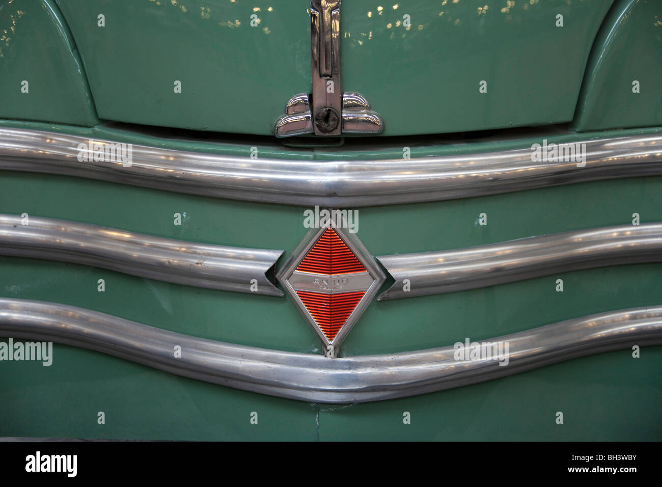 Green Renault  4cv  car badge at  Schlumpfs motor  Museum Mulhouse France horizontal Stock Photo