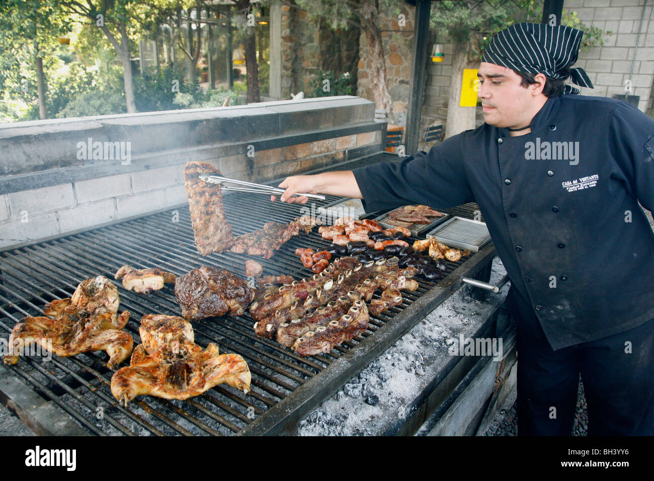 Meat grilled on the parilla in Casa del Visitante restaurant at the Zuccardi family winery in Maipu, Mendoza region, Argentina. Stock Photo