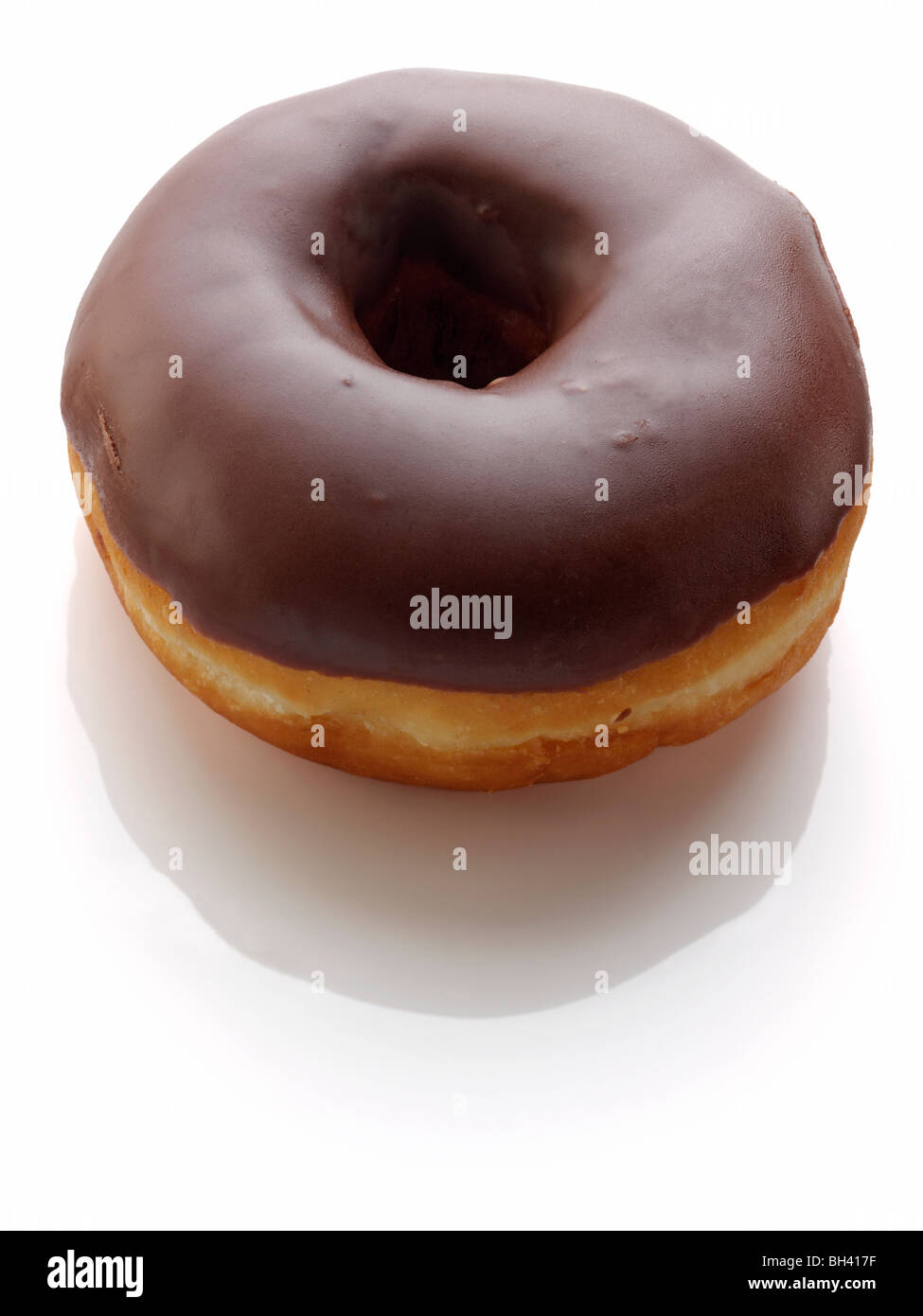 A chocolate doughnut on a white background Stock Photo - Alamy