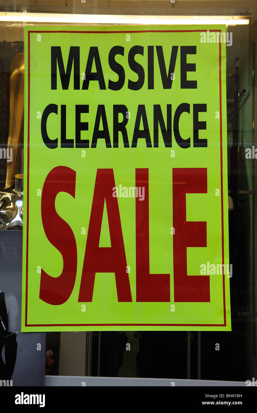sale poster in a shop window Sale clearance cut-price recession Christmas New Year bargain January sales Stock Photo