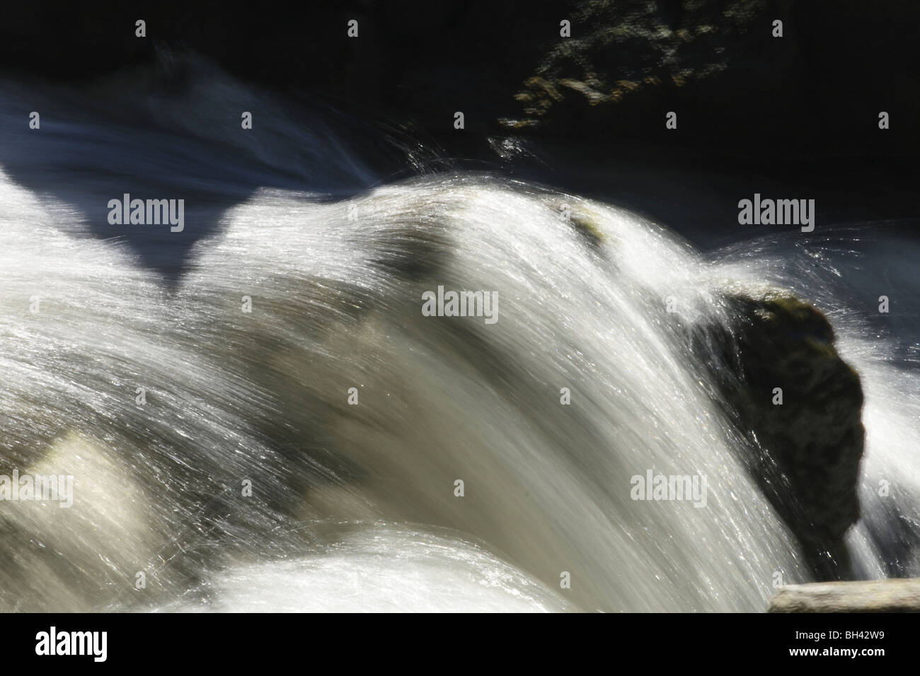 Water rushing over Rogie Falls waterfall Stock Photo - Alamy