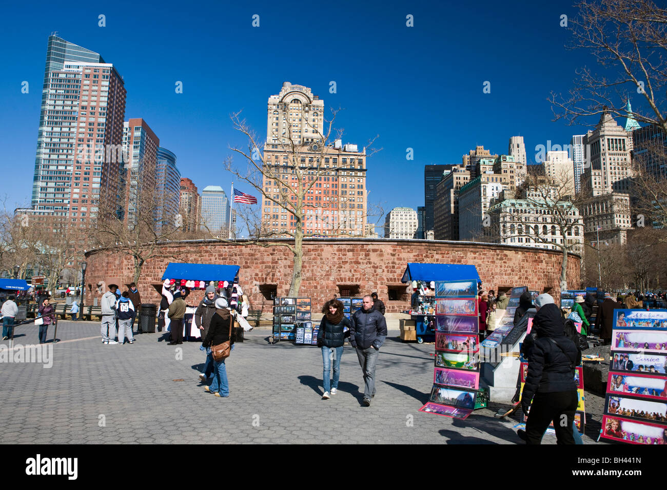 Street vendors and tourists at Castle Clinton National Monument, Manhattan, New York City, New York Stock Photo
