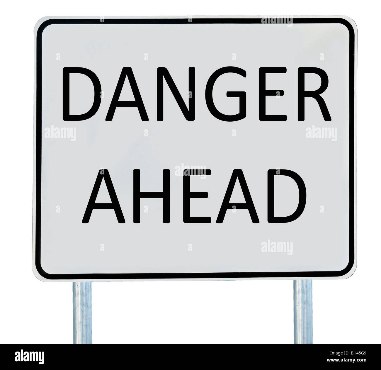 A 'Danger Ahead' road sign isolated on white. Stock Photo