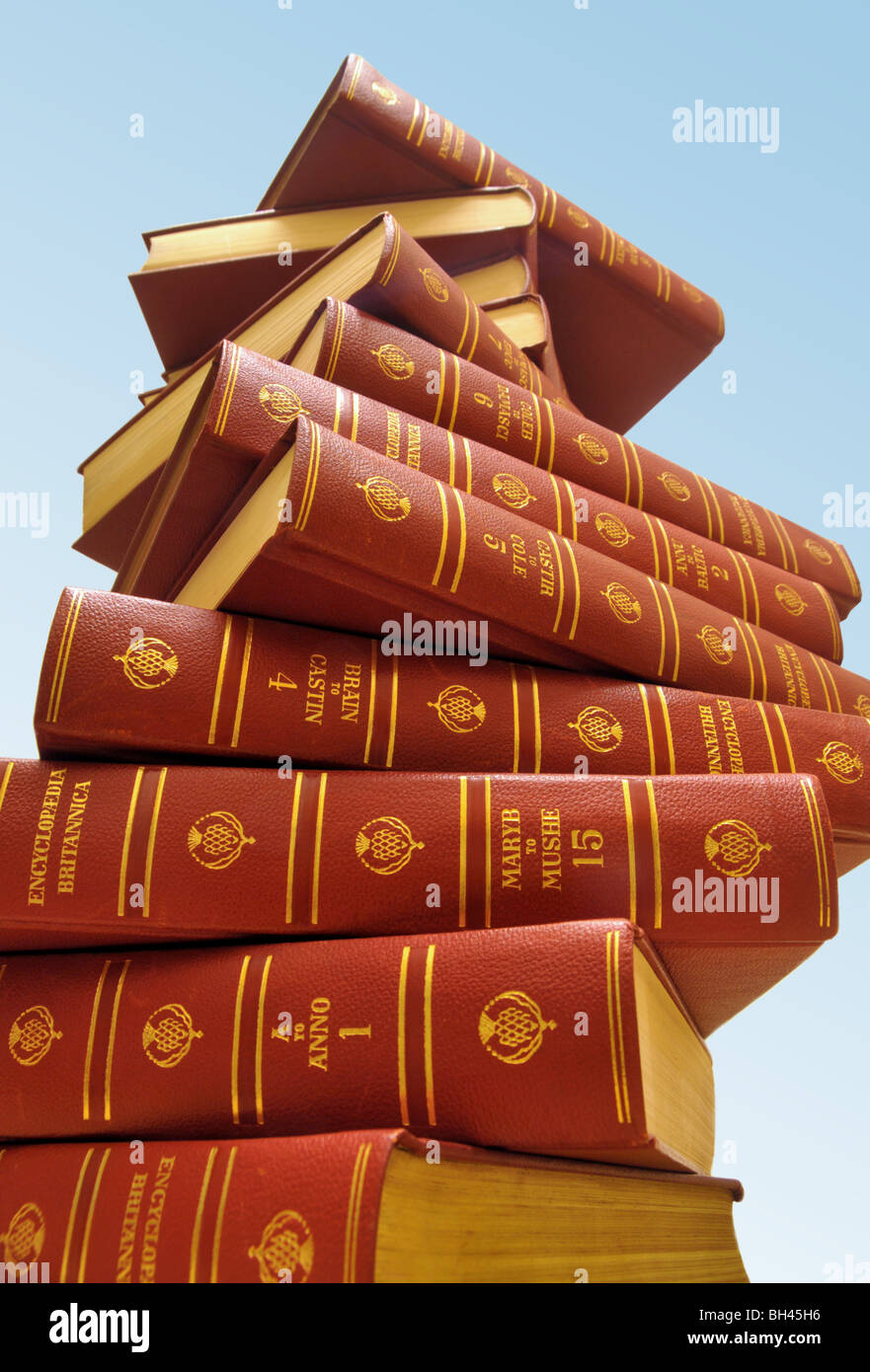 looking up to a volume of encyclopedia Britannica towering above, Stock Photo