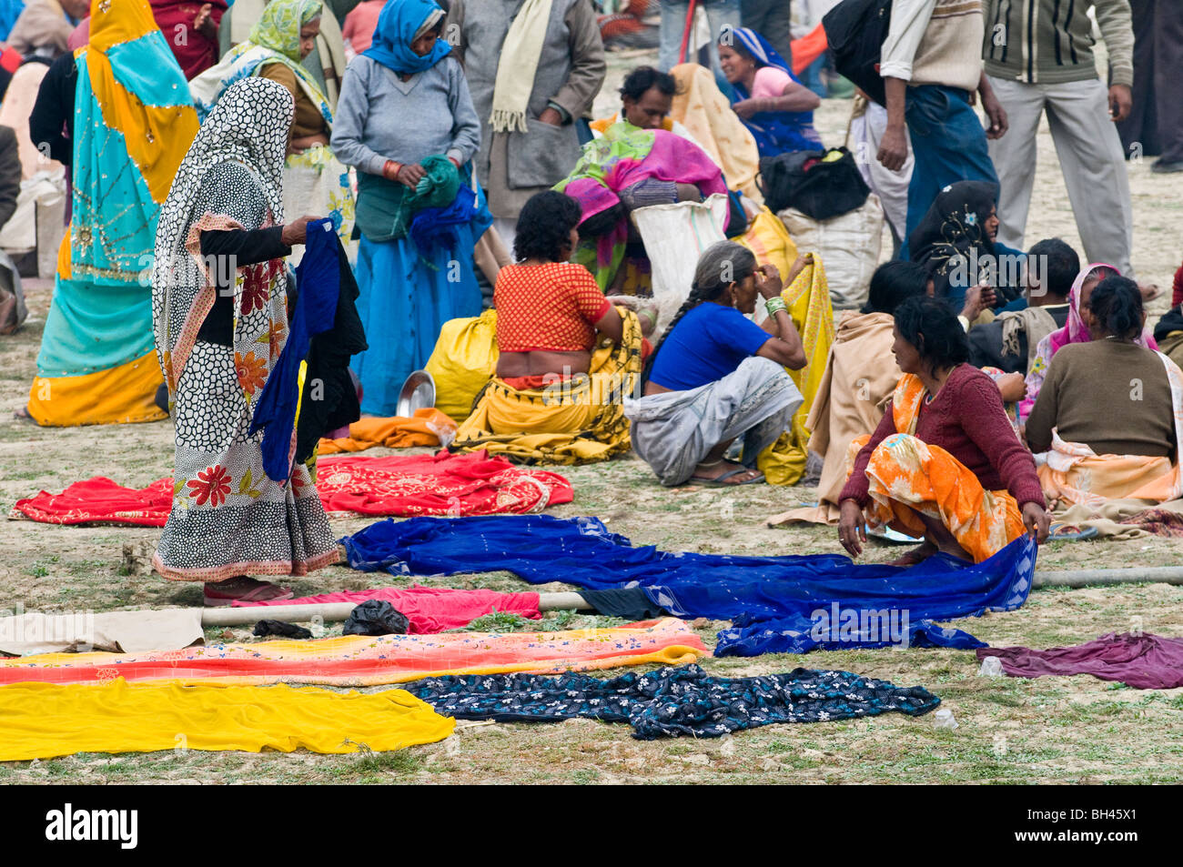 Drying up the saris during the colorful Gangasagar mela in West Bengal, India. Stock Photo