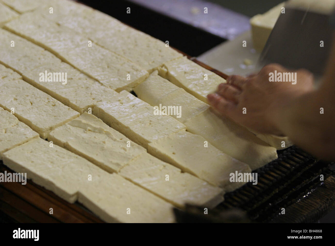 Making tofu in tofu shop, with GE free soya. Tokyo, Japan Stock Photo