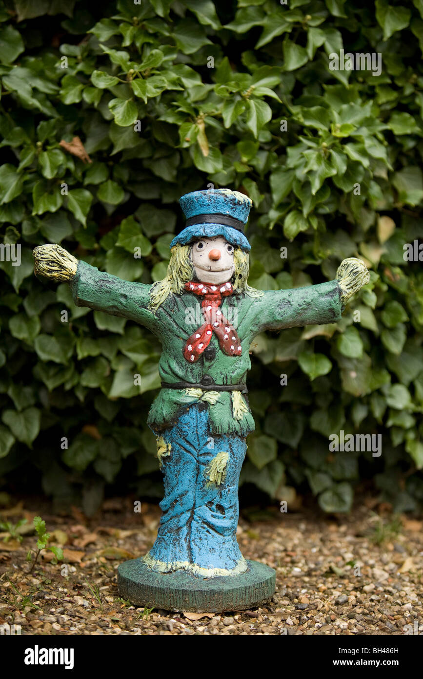 Scarecrow statue in garden. Stock Photo