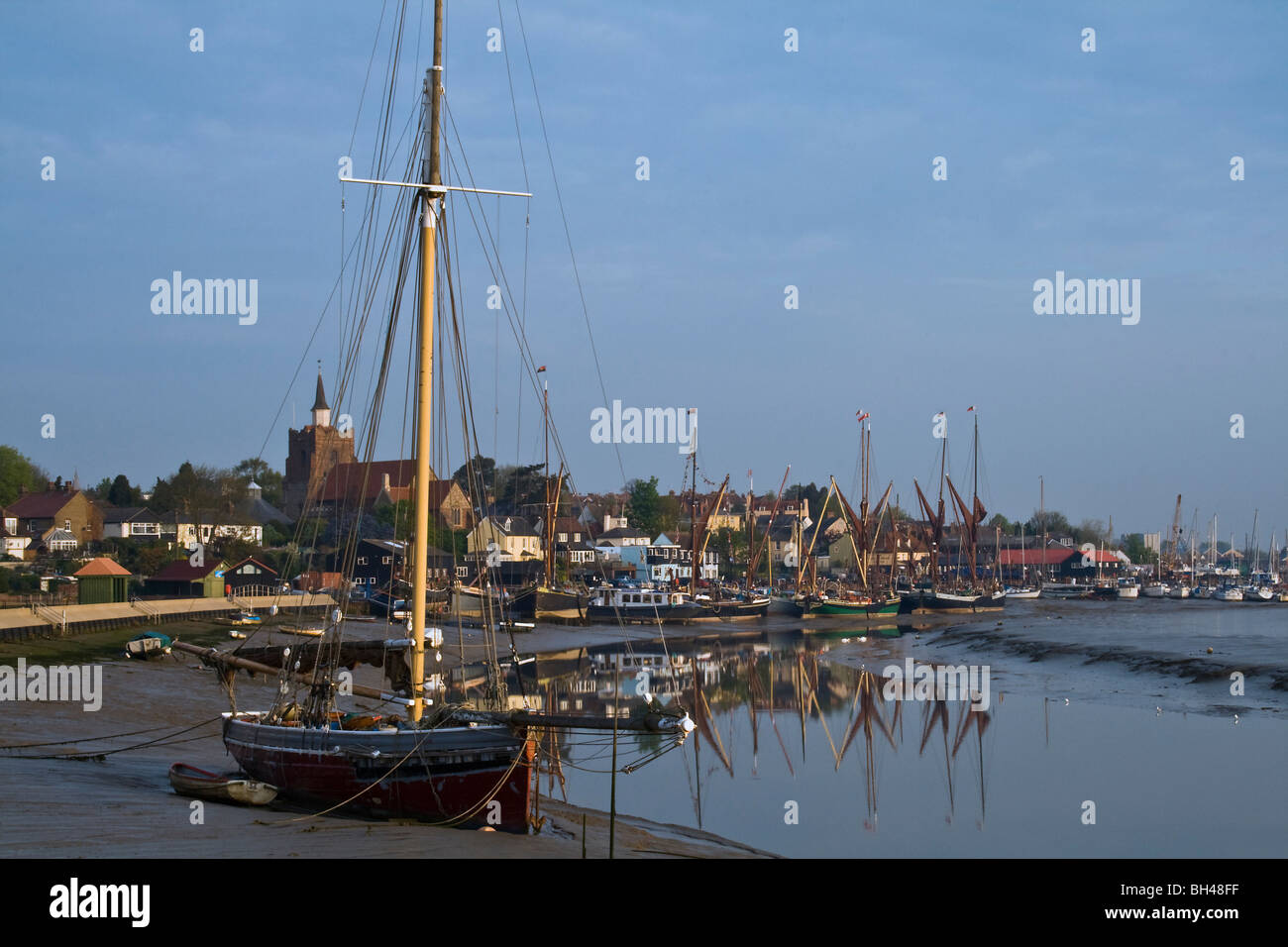 Oyster smack with the promenade of Maldon and Thames barges in the background. Stock Photo
