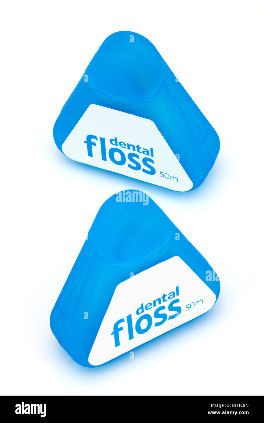 Two plastic blue flip top containers of 50 meters of dental floss Stock Photo