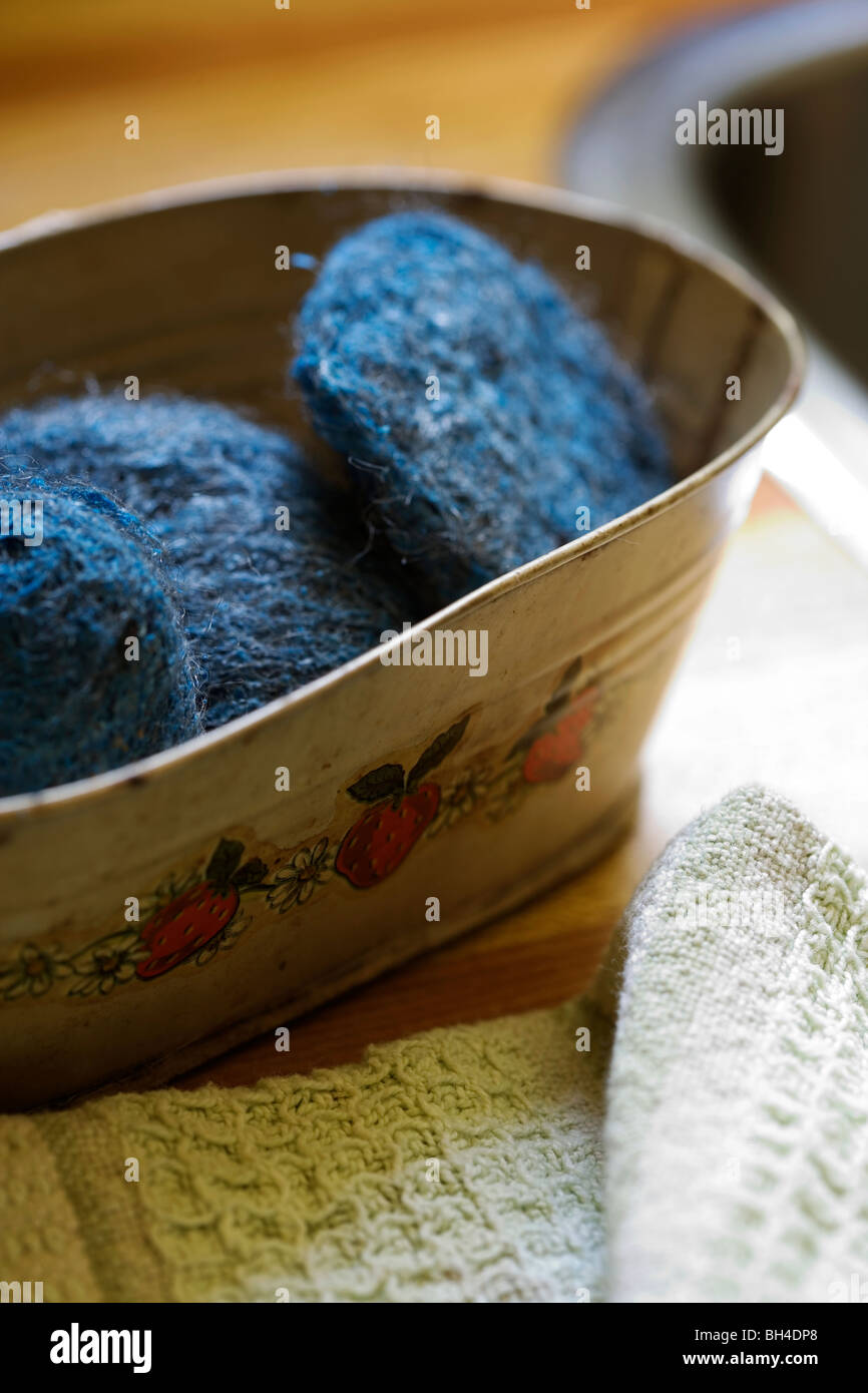 Scouring pads in a holder by a sink Stock Photo Alamy