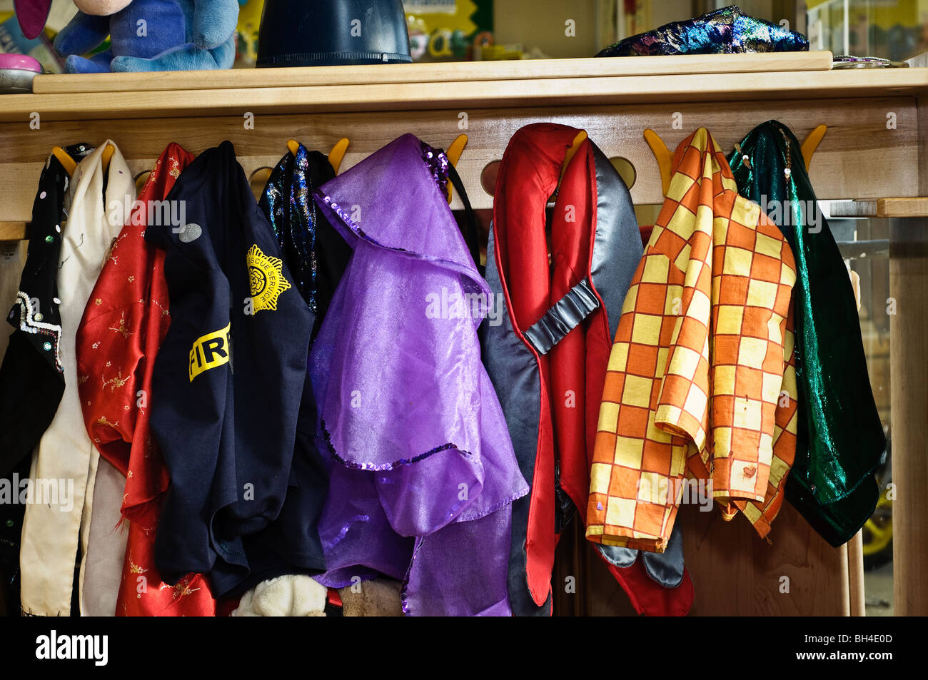 Coats hanging up at a nursery. Stock Photo