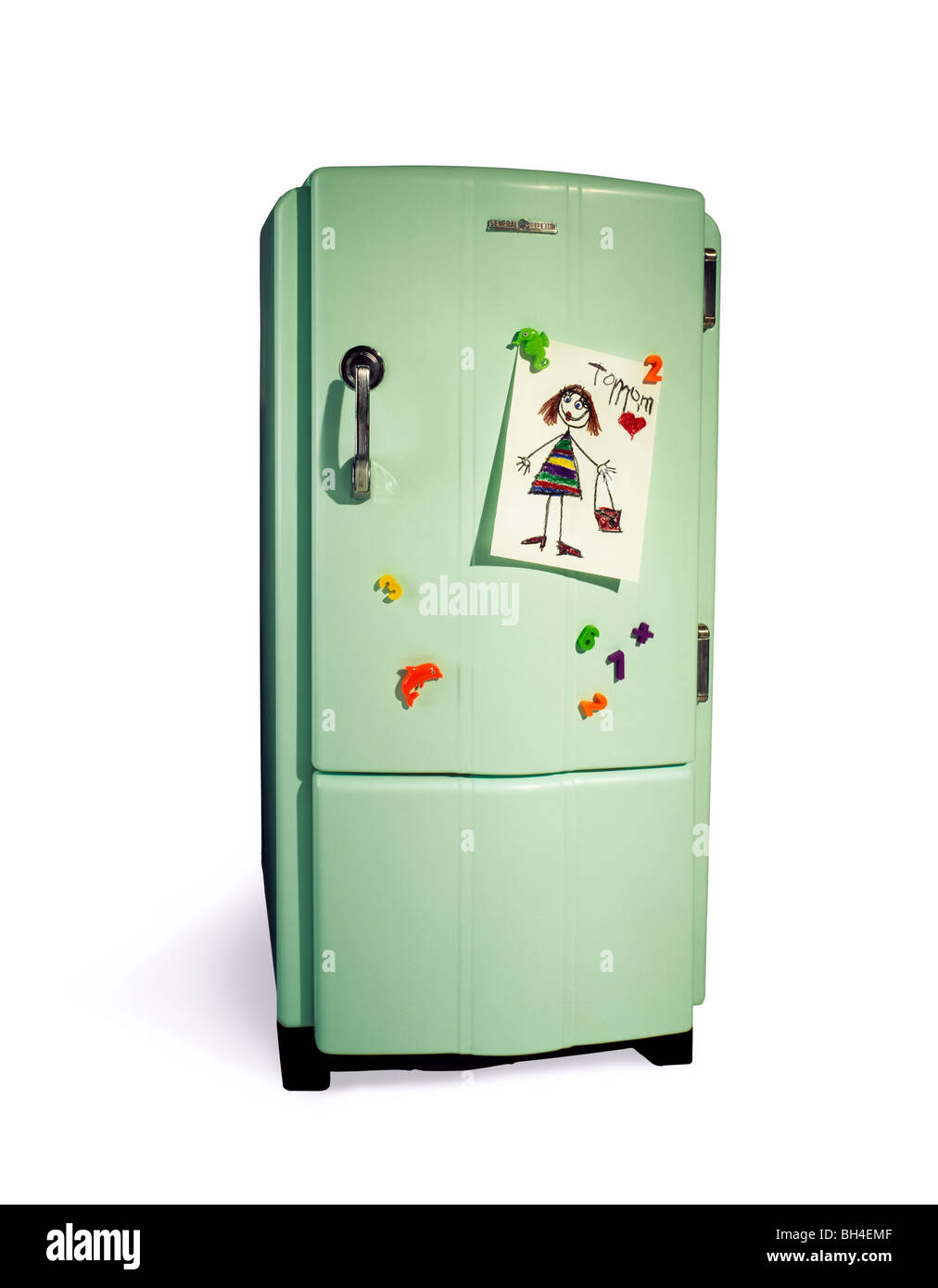 Fridge with a child's drawing and on a white background Stock