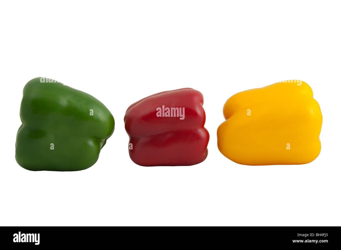 Green, red and yellow peppers isolated on white Stock Photo - Alamy