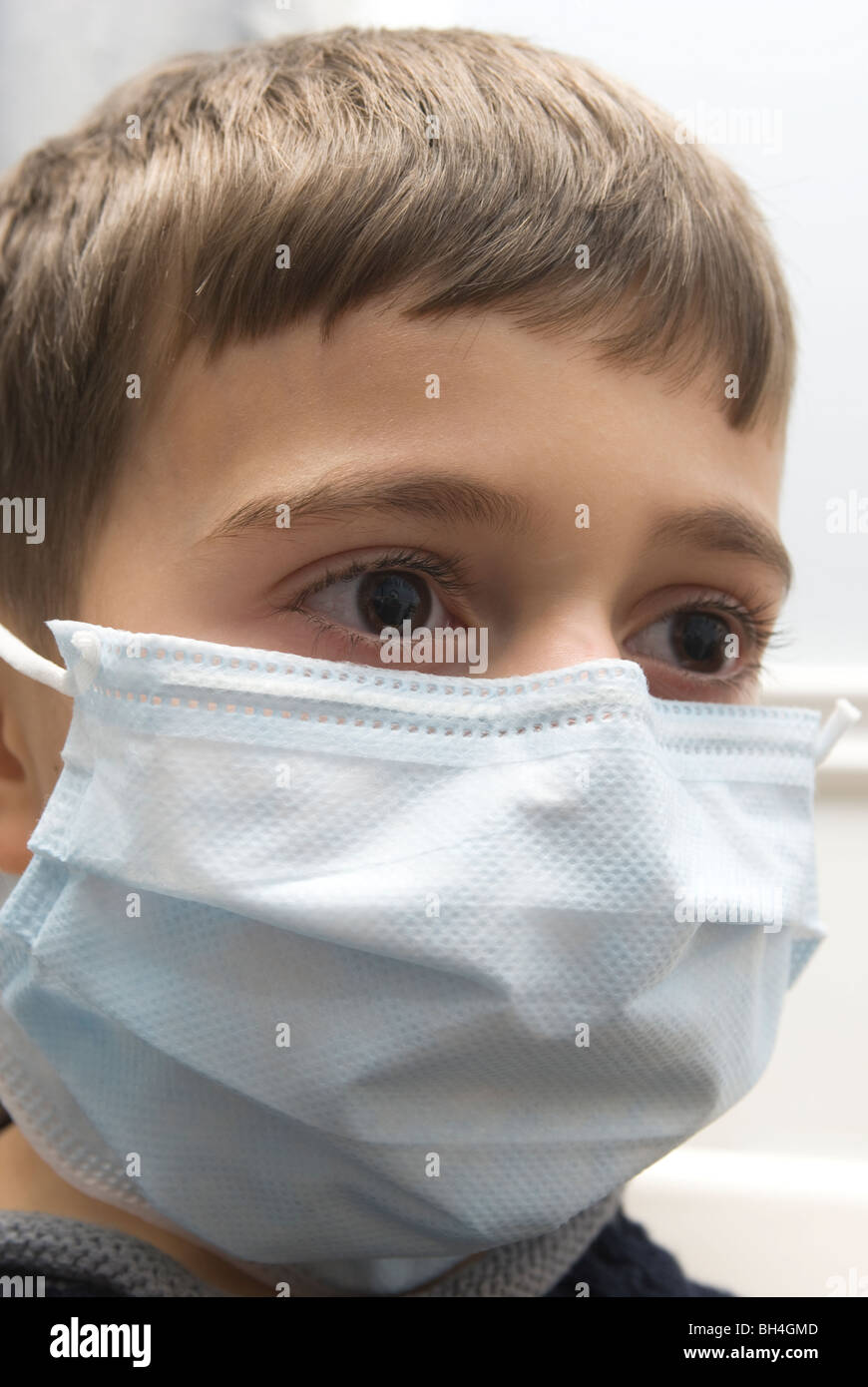 Young boy wearing medical mask to prevent viral infection, Montreal ...
