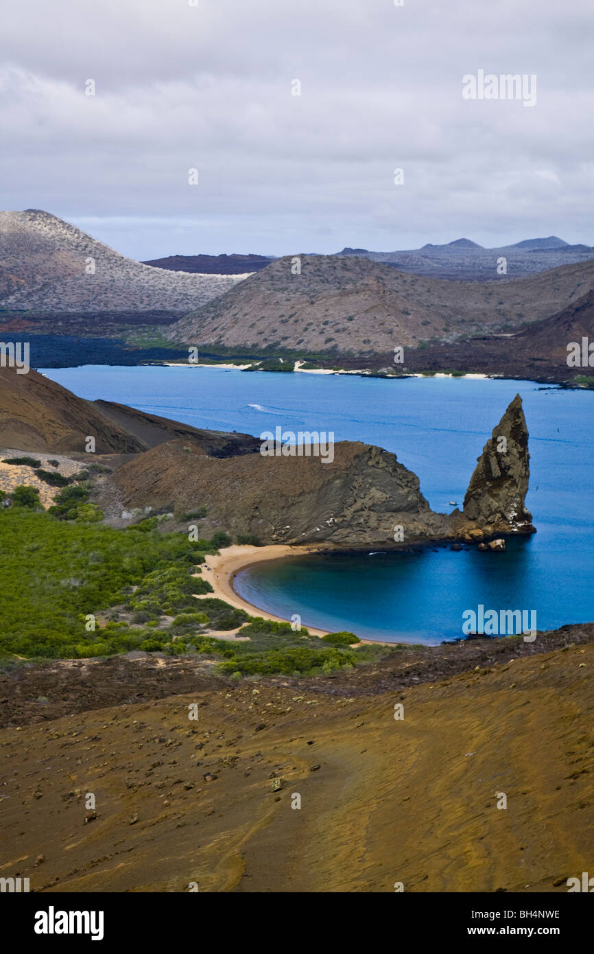 This view of Pinnacle Rock and Bahia Sullivan is one of the most iconic and frequently photographed scenes in Galapagos Islands Stock Photo