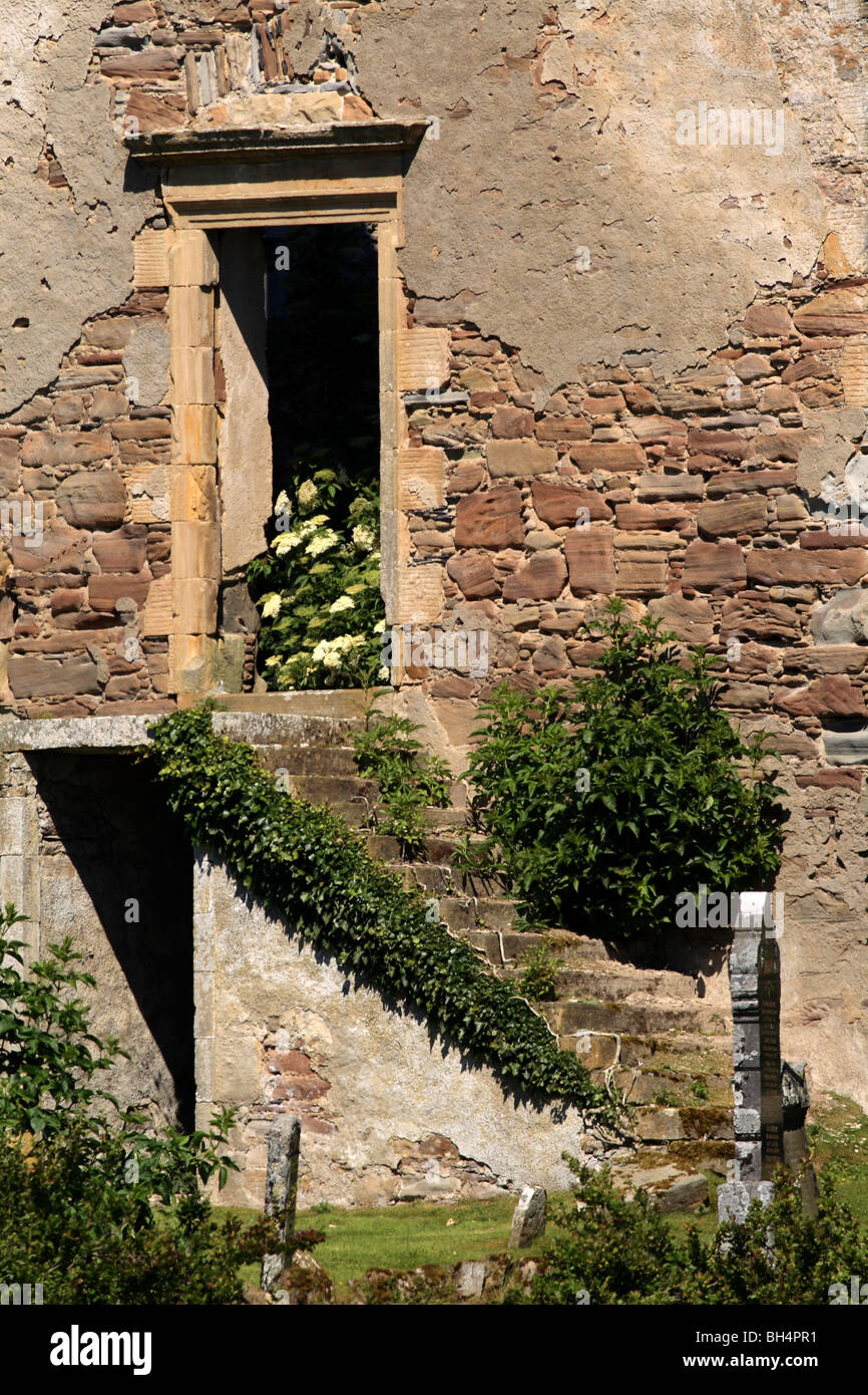 Derelict church building showing detail of stonework, doorway and stairs. Evantone burial ground, disused. Stock Photo