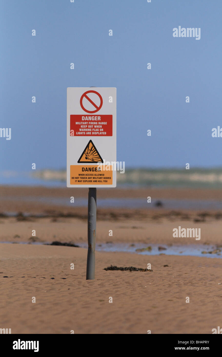 RAF bombing range warning sign on beach. Stock Photo