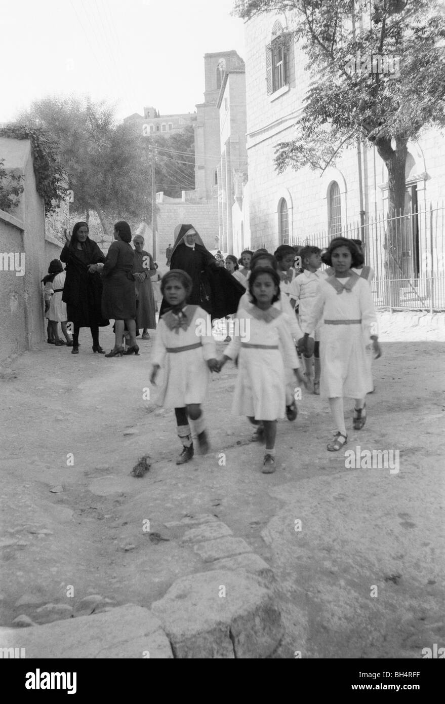 children going to school in 1930-40's Stock Photo