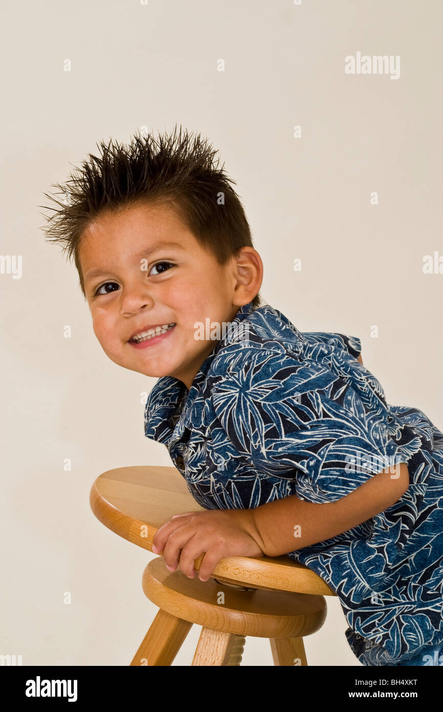 little boy Hispanic 3 year old boy studio shot. eye contact MR  © Myrleen Pearson Stock Photo