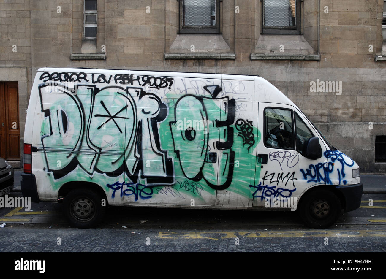 Graffiti covered van in Paris Stock Photo - Alamy