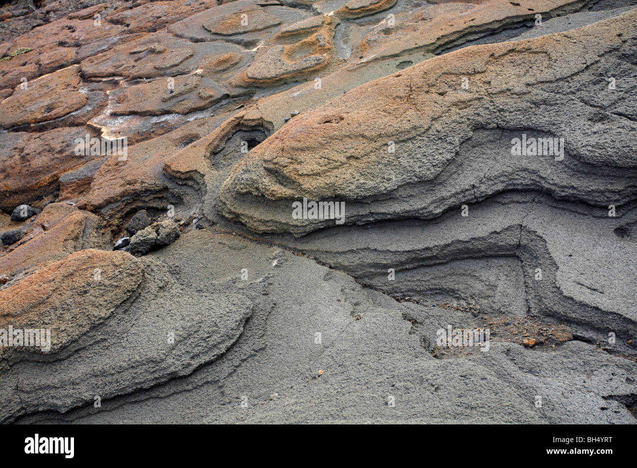 Lava flows abstract, part of the landscape of Isla Bartolome, Bartolome Island. Stock Photo