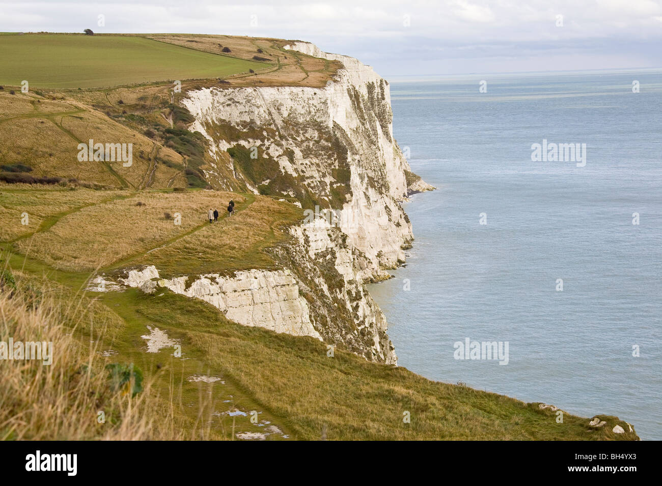 Hillwalking on the white cliffs along the coast of Dover. Stock Photo