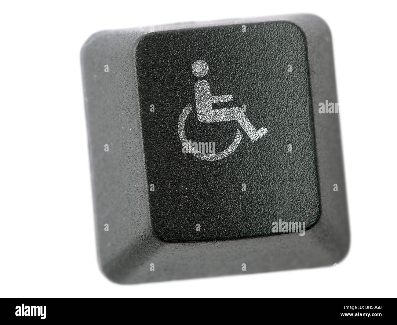 Black keyboard key with handicapped symbol on white background Stock Photo
