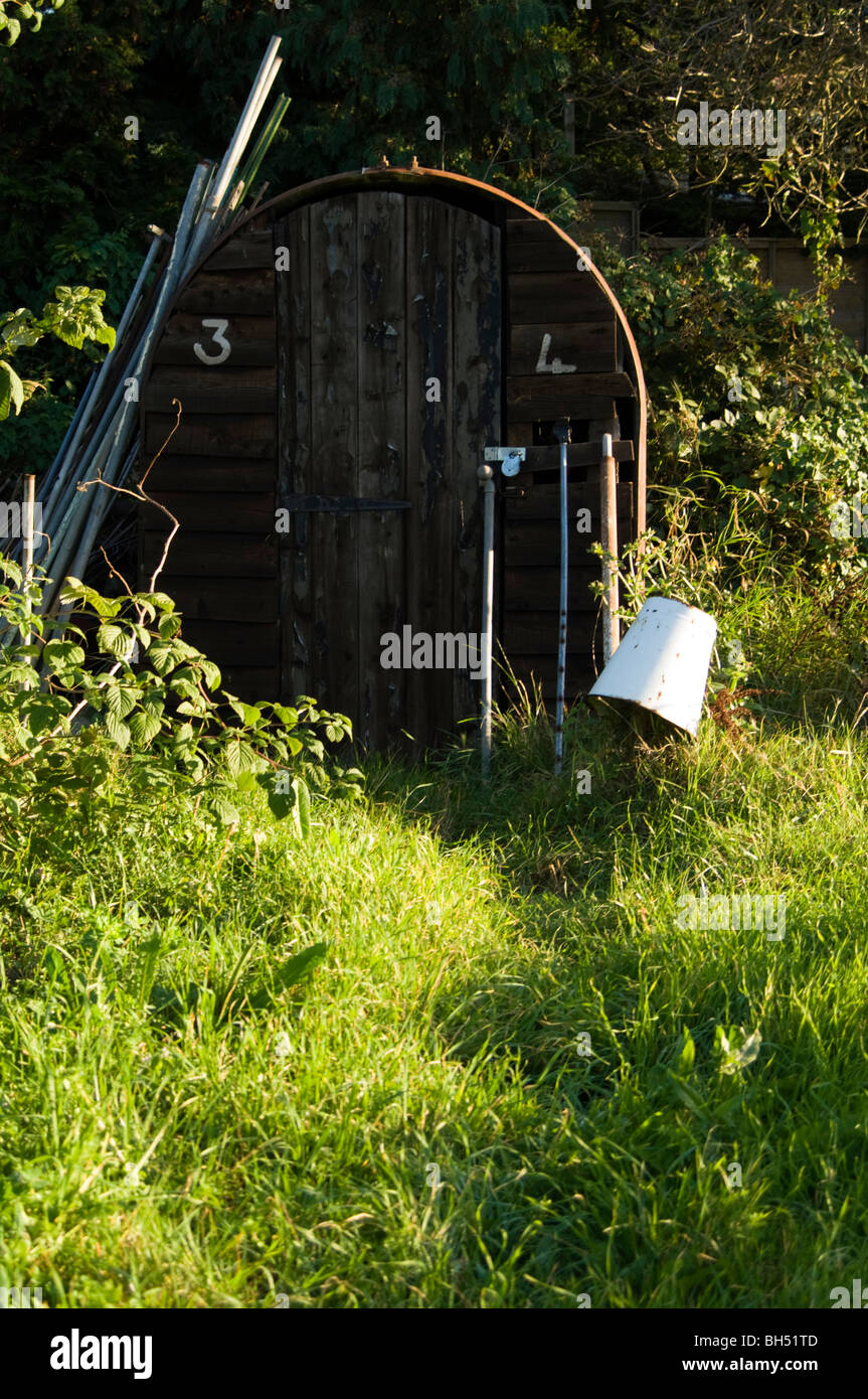 Old Anderson Shelter being used as a shed on an allotment plot. Stock Photo