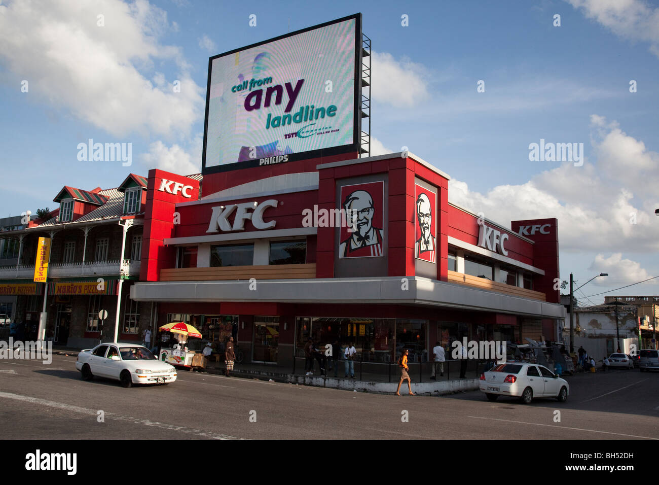 KFC that sells the most chicken of any franchise in the world, Port of Spain, Trinidad Stock Photo